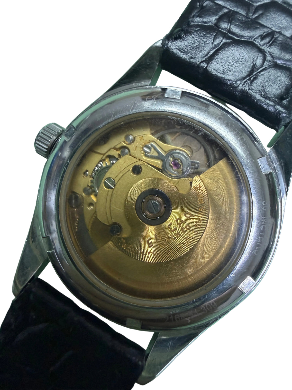 ⁠[星鑽外圈・中文雙曆] Enicar 英納格 白面羅馬字 自動機械錶 Cal. AR 2168 金色透底機芯 配黑皮帶⁠
